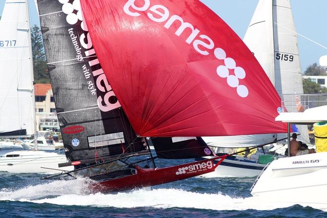 Race 1 – Smeg fights her way through the harbour traffic shortly after rounding the windward mark – 18ft Skiffs NSW Championship ©  Frank Quealey / Australian 18 Footers League